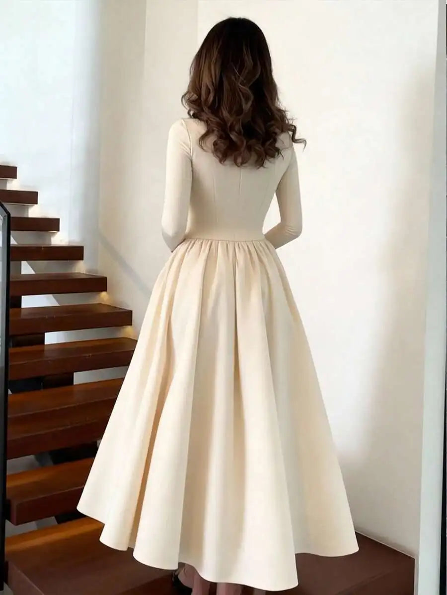 Elegant Pleated Maxi Dress With Long Sleeves And A-Line Skirt